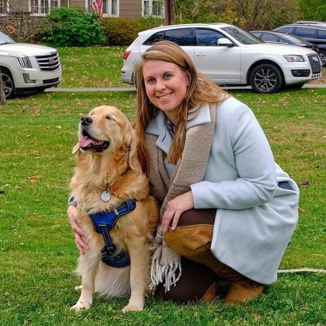 Owner of Lilleau Fashion Boutique Jennifer and her golden retriever Lily