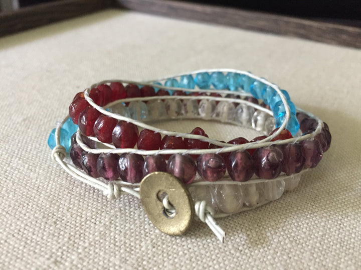 Red, white and blue beaded wrap bracelet with white cord and hammered copper button closure